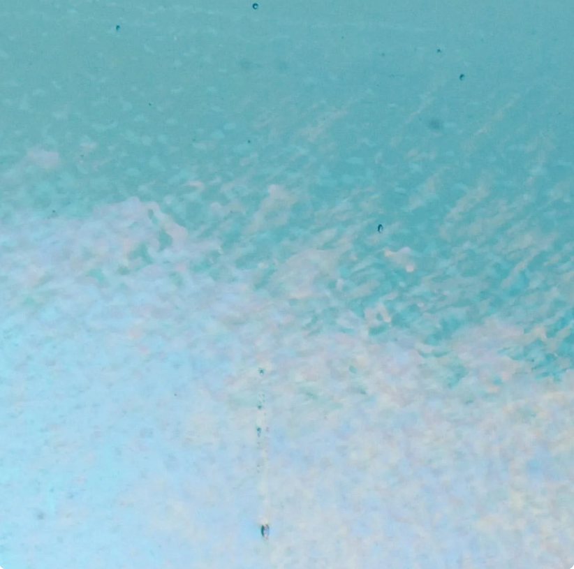 Featured image for “Light Turquoise Blue Transparent Rainbow Iridescent Fusible 90 BU 001416-0031-F”