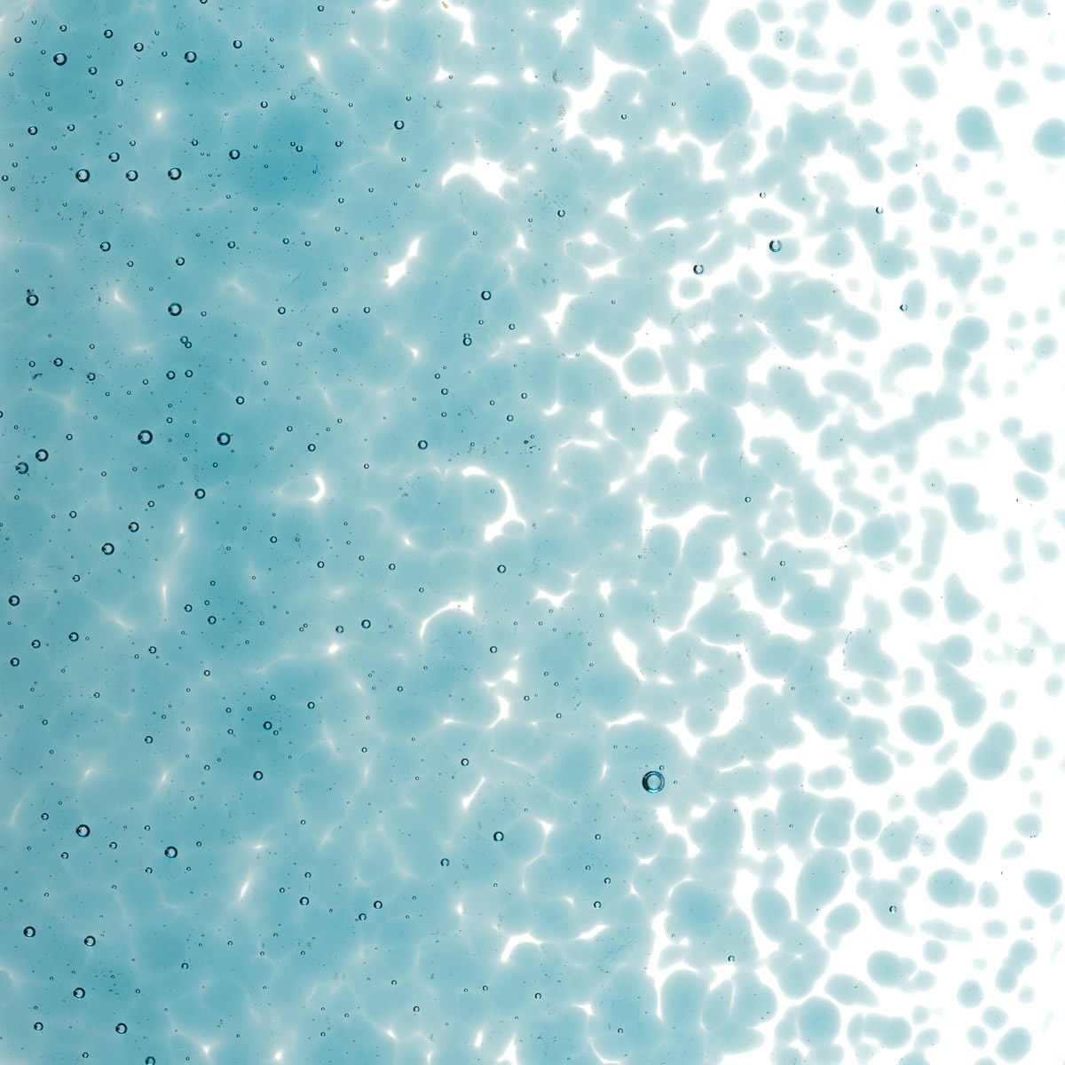 Featured image for “Sea Blue Transparent, Medium Frit 001444-0002-F_01”