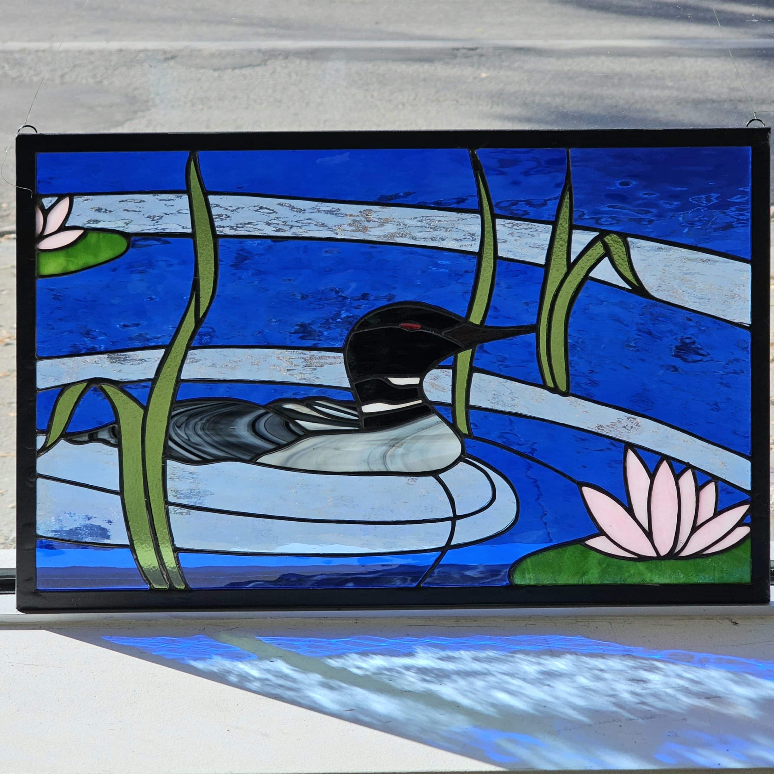 Featured image for ““Loon and Water Lilies””